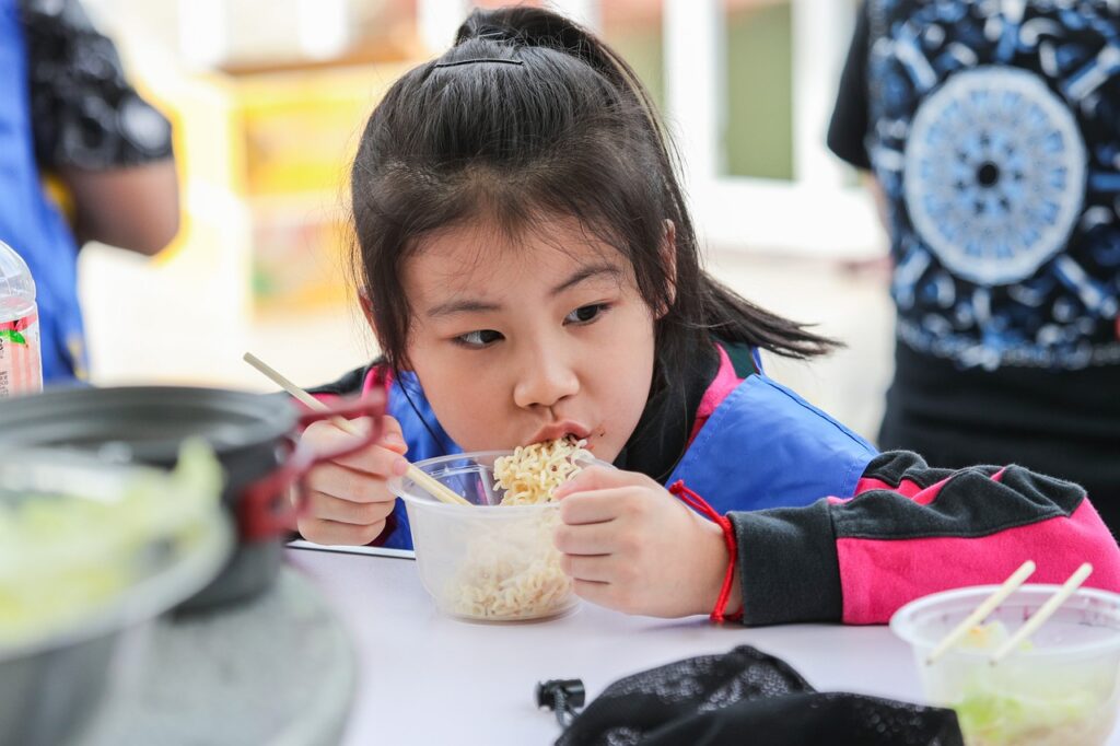 girl, eating, noodles-7434482.jpg